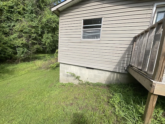 180 Barbee Ave, Ripley, TN 38063 - view of side of home featuring a yard and crawl space