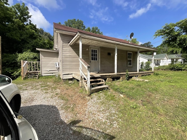 180 Barbee Ave, Ripley, TN 38063 - view of front of home featuring a porch and a front yard