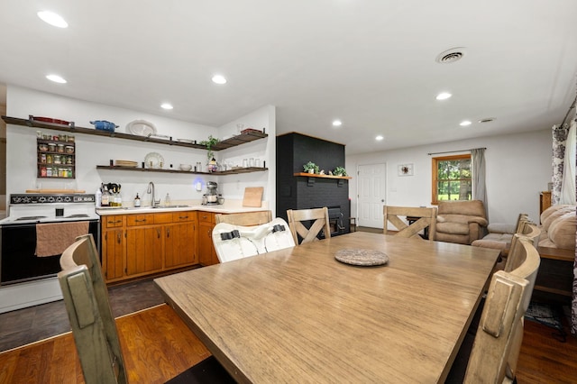 472 Shirley Rd, Smyrna, TN 37167 - dining space featuring bar with sink, dark wood-style flooring, and recessed lighting