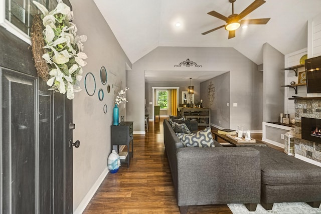 103 N Main St, Springfield, TN 37172 - living area with a ceiling fan, wood finished floors, lofted ceiling, a stone fireplace, and a chandelier