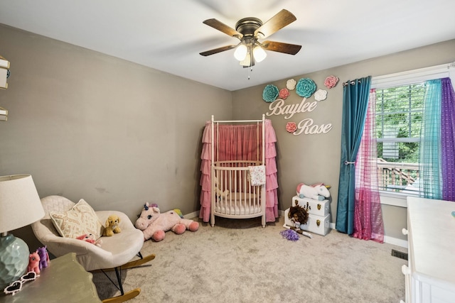 103 N Main St, Springfield, TN 37172 - carpeted bedroom featuring a crib and a ceiling fan