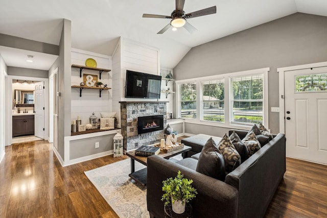 103 N Main St, Springfield, TN 37172 - living area featuring vaulted ceiling, ceiling fan, a fireplace, and wood finished floors
