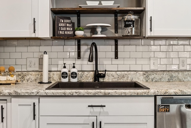 103 N Main St, Springfield, TN 37172 - kitchen with dishwasher, decorative backsplash, white cabinets, open shelves, and light stone counters