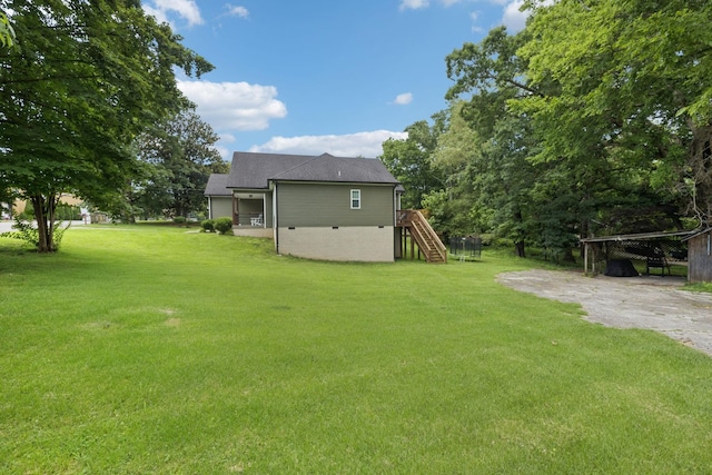 103 N Main St, Springfield, TN 37172 - view of green lawn featuring stairs and a deck