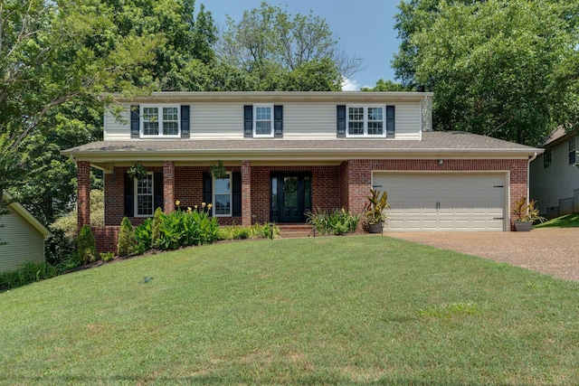 1448 Brighton Cir, Old Hickory, TN 37138 - traditional home with brick siding, concrete driveway, a front lawn, covered porch, and an attached garage