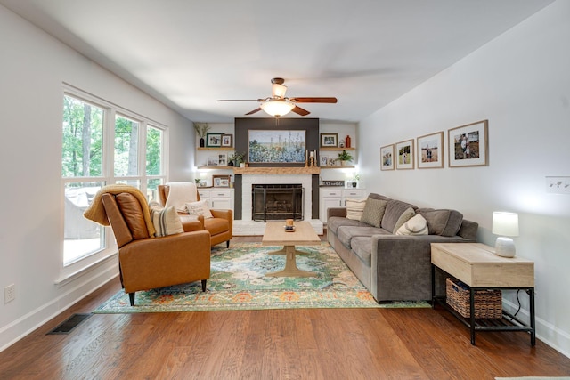 1448 Brighton Cir, Old Hickory, TN 37138 - living room featuring a ceiling fan, a brick fireplace, and wood finished floors