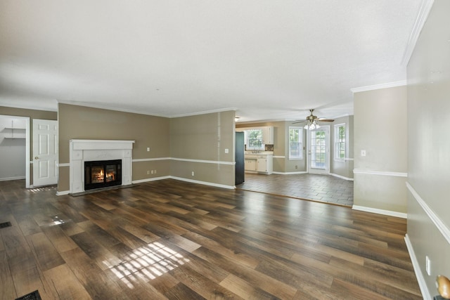 3171 Asbury Ln, Murfreesboro, TN 37129 - unfurnished living room with crown molding, a glass covered fireplace, wood finished floors, and a ceiling fan