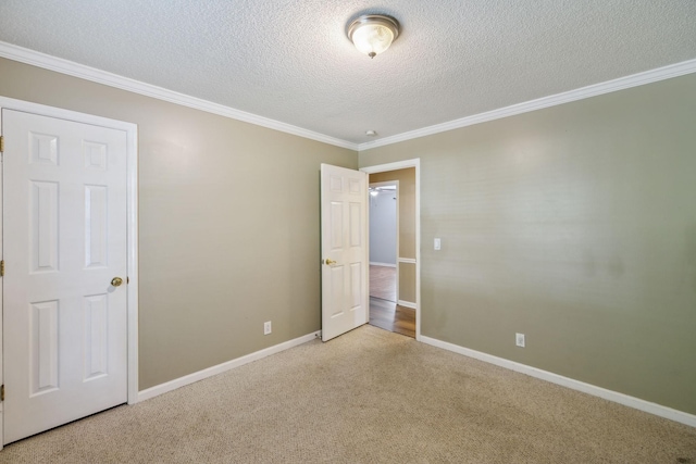 3171 Asbury Ln, Murfreesboro, TN 37129 - unfurnished bedroom featuring crown molding, carpet, and a textured ceiling