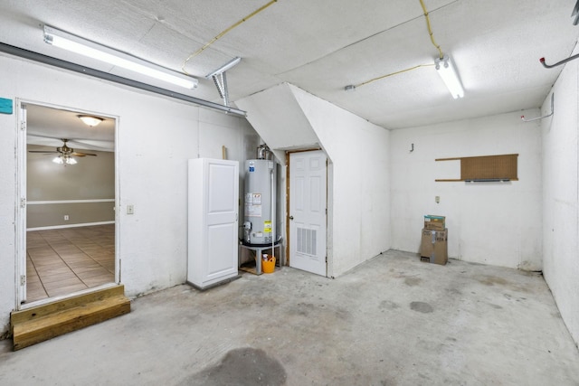3171 Asbury Ln, Murfreesboro, TN 37129 - garage with gas water heater and a ceiling fan