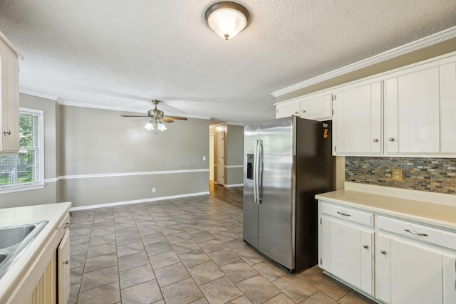 3171 Asbury Ln, Murfreesboro, TN 37129 - kitchen featuring stainless steel fridge with ice dispenser, ceiling fan, crown molding, a textured ceiling, and light countertops