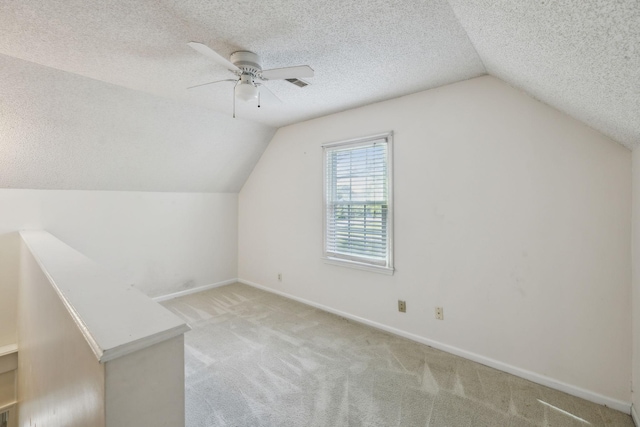 3171 Asbury Ln, Murfreesboro, TN 37129 - additional living space with lofted ceiling, ceiling fan, light carpet, and a textured ceiling