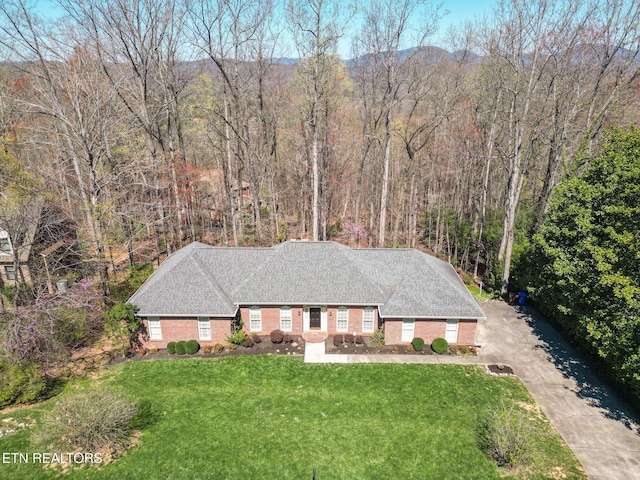 182 Whippoorwill Dr, Oak Ridge, TN 37830 - view of front of home featuring a front yard, asphalt driveway, and brick siding