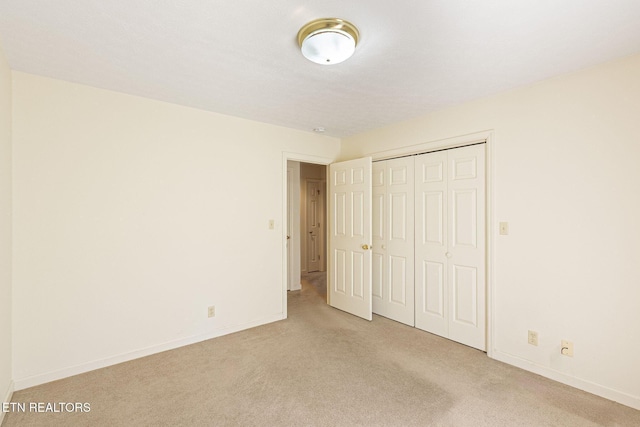182 Whippoorwill Dr, Oak Ridge, TN 37830 - unfurnished bedroom featuring light colored carpet and a closet