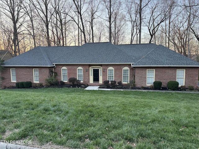 182 Whippoorwill Dr, Oak Ridge, TN 37830 - view of front of property featuring a shingled roof, brick siding, and a front yard