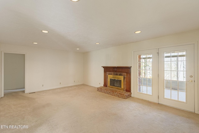 182 Whippoorwill Dr, Oak Ridge, TN 37830 - unfurnished living room featuring light carpet, recessed lighting, and a fireplace
