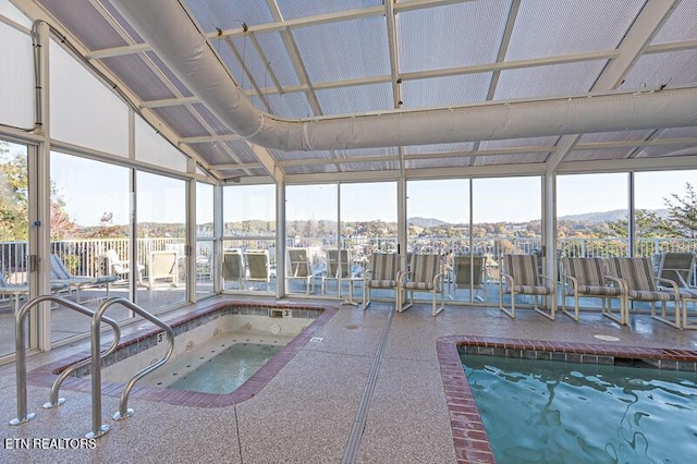 205 Ogle Dr Unit 554, Pigeon Forge, TN 37863 - view of pool featuring a patio area and an in-ground hot tub