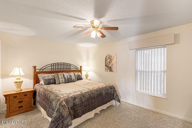 205 Ogle Dr Unit 554, Pigeon Forge, TN 37863 - carpeted bedroom with a textured ceiling and ceiling fan