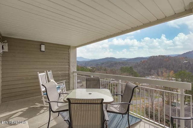 205 Ogle Dr Unit 554, Pigeon Forge, TN 37863 - balcony with a mountain view and outdoor dining space