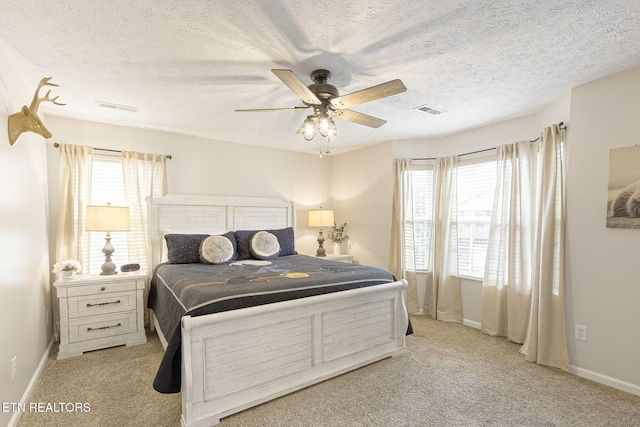 2032 Slippery Rock Cir, Sevierville, TN 37862 - bedroom with light carpet, a textured ceiling, and ceiling fan