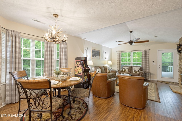 2032 Slippery Rock Cir, Sevierville, TN 37862 - dining room with wood finished floors, a chandelier, a textured ceiling, lofted ceiling, and ceiling fan