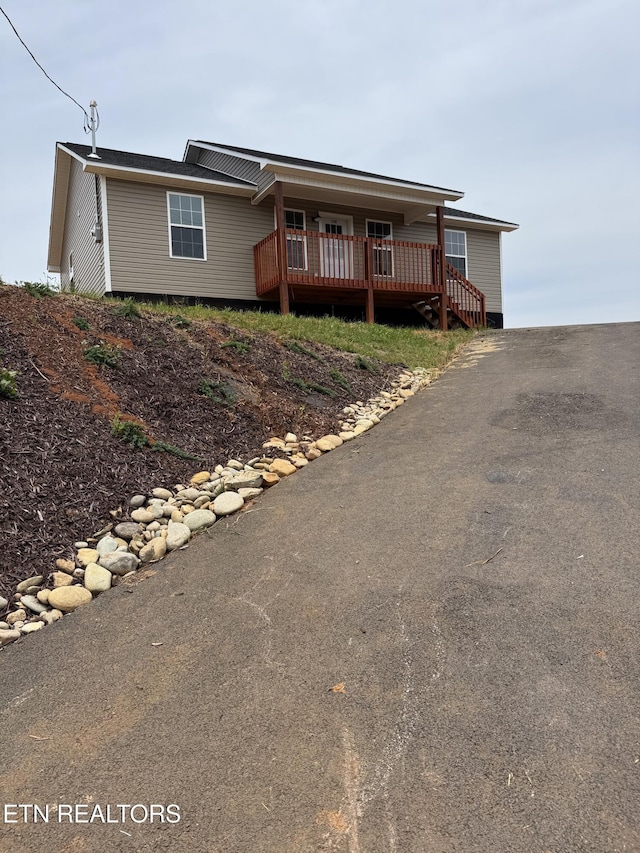 3296 Parker Blvd, Kodak, TN 37764 - manufactured / mobile home featuring a wooden deck