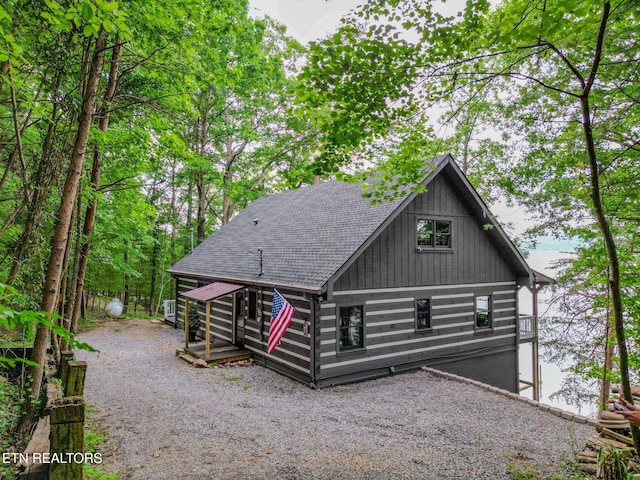 1226 Buzzard Roost Rd, Spring City, TN 37381 - back of house featuring a shingled roof and a wooden deck