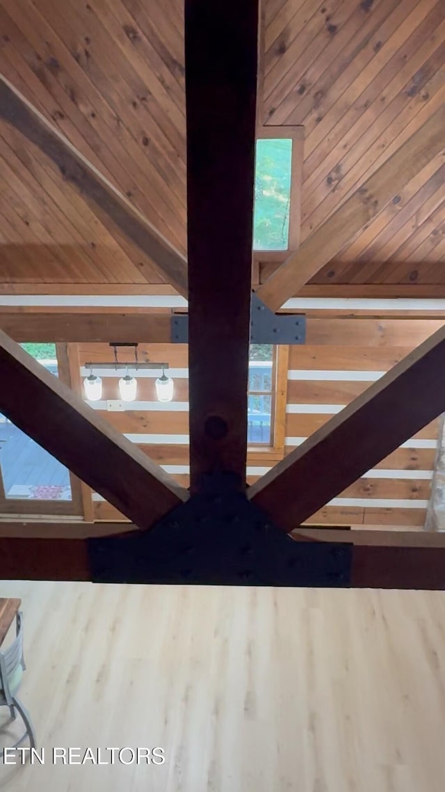1226 Buzzard Roost Rd, Spring City, TN 37381 - detailed view of a wood ceiling with exposed beams, a skylight, and wood walls