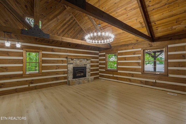 1226 Buzzard Roost Rd, Spring City, TN 37381 - unfurnished living room featuring wooden walls, a chandelier, a wooden ceiling with exposed beams, wood finished floors, and a fireplace