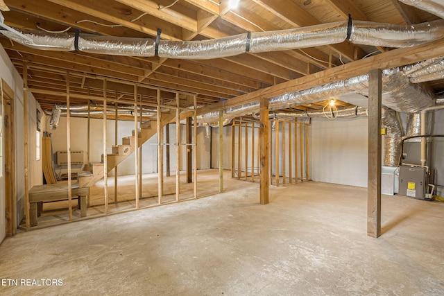 1226 Buzzard Roost Rd, Spring City, TN 37381 - unfinished basement featuring heating unit and stairway