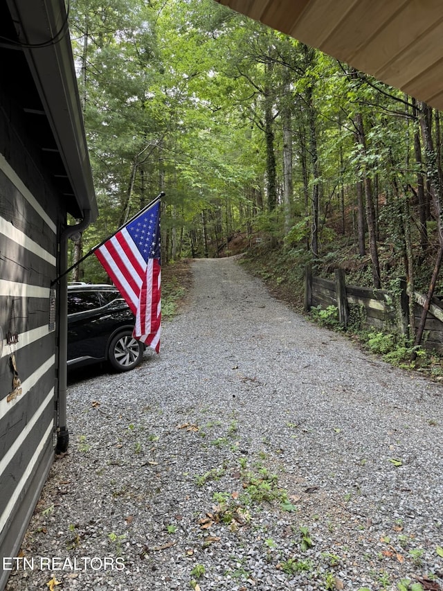 1226 Buzzard Roost Rd, Spring City, TN 37381 - view of vehicle parking with a wooded view