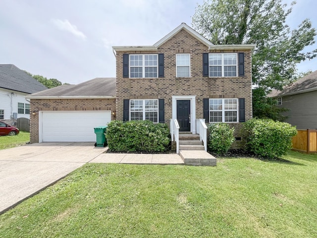 1564 Laurel Ledge Dr, La Vergne, TN 37086 - view of front facade with a garage, brick siding, and driveway