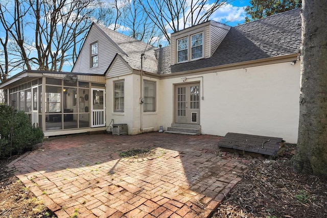 1302 Hampshire Pike, Columbia, TN 38401 - rear view of property with entry steps, a sunroom, a patio area, french doors, and stucco siding
