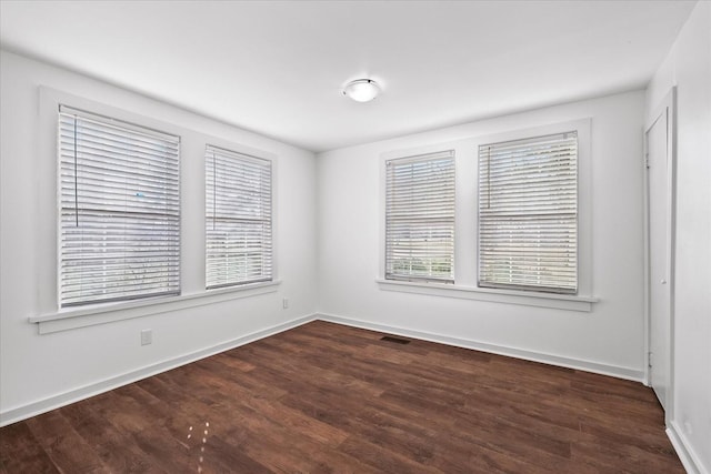 1302 Hampshire Pike, Columbia, TN 38401 - empty room featuring wood finished floors and baseboards