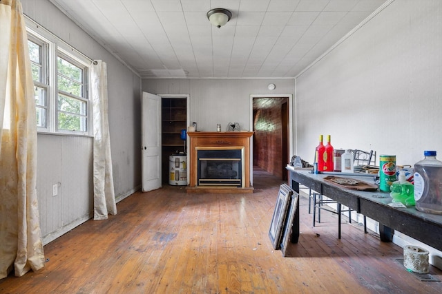2727 Old Tilton Rd, Dalton, GA 30721 - dining area featuring hardwood / wood-style floors, crown molding, and a glass covered fireplace