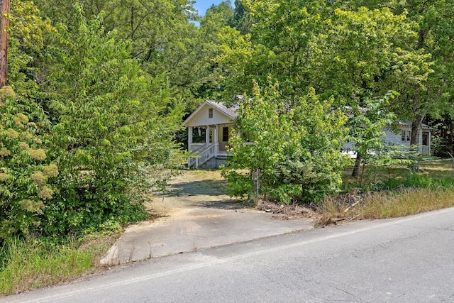 2727 Old Tilton Rd, Dalton, GA 30721 - view of property hidden behind natural elements with covered porch