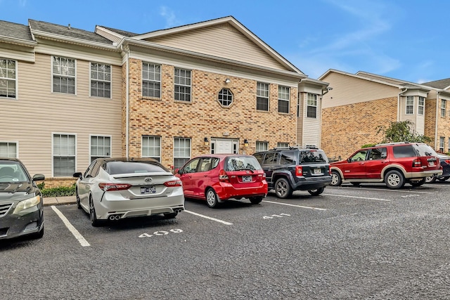411 Churchill Xing, Madison, TN 37115 - view of front of property featuring uncovered parking and brick siding