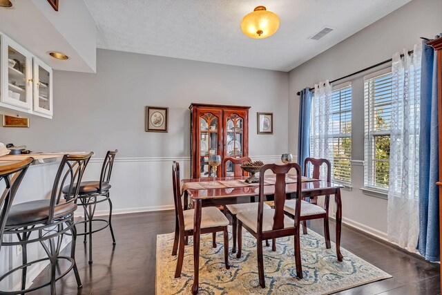 411 Churchill Xing, Madison, TN 37115 - dining room with dark wood finished floors and a textured ceiling