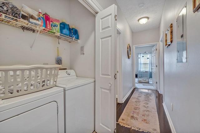 411 Churchill Xing, Madison, TN 37115 - washroom featuring separate washer and dryer, wood finished floors, and a textured ceiling