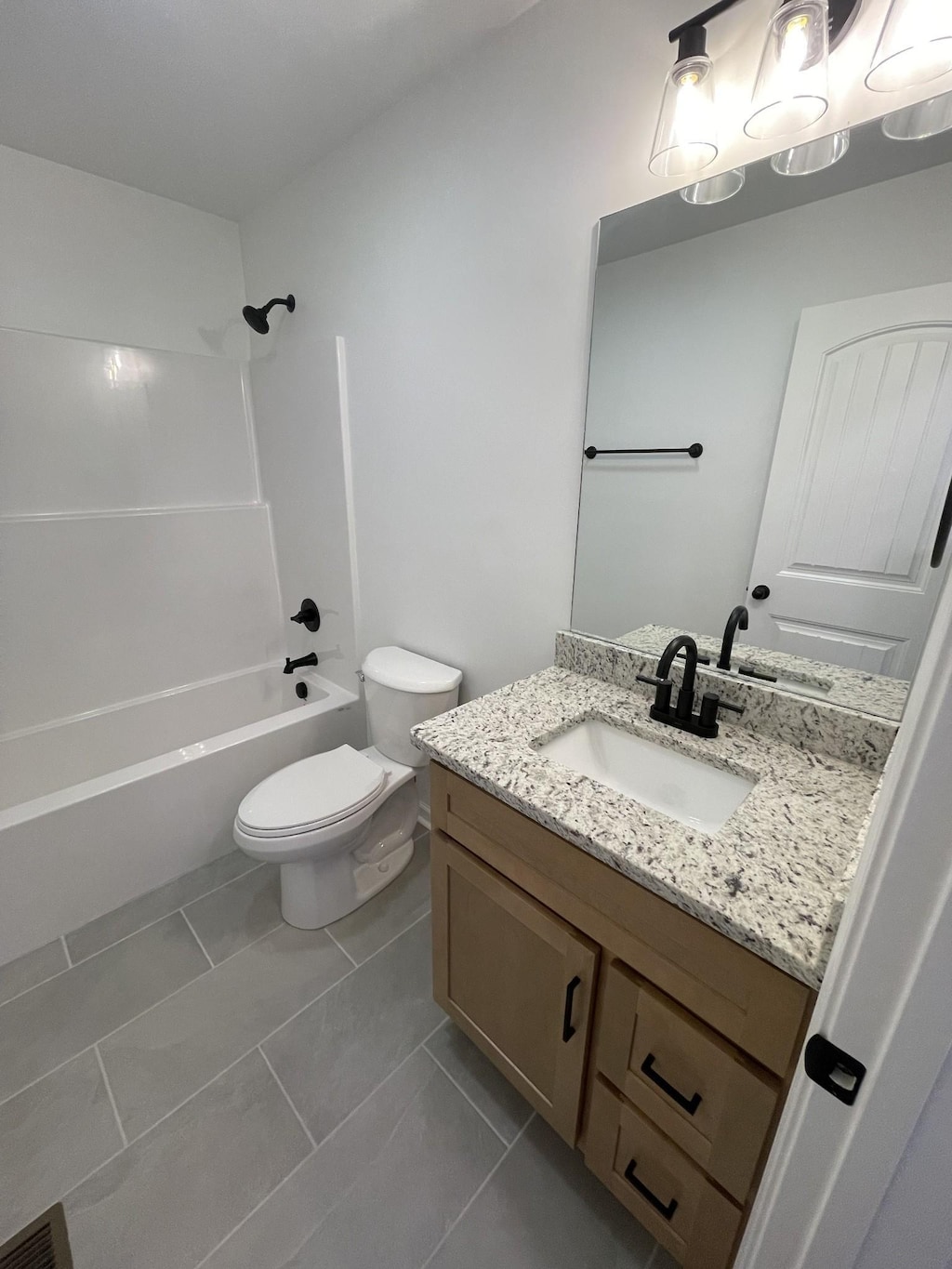 2798 Highland Rd, Lafayette, TN 37083 - bathroom featuring vanity and shower / bath combination