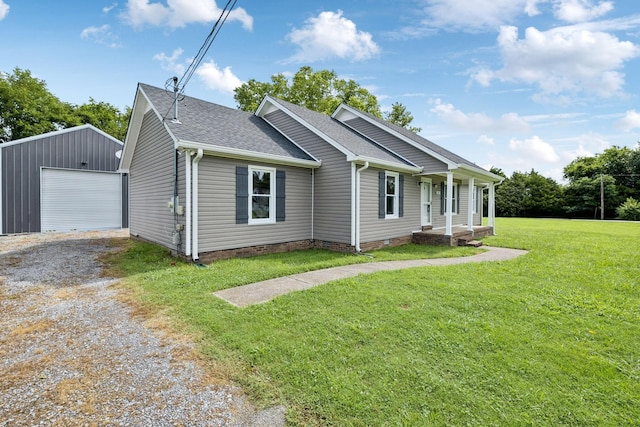 111 Platte Dr, Christiana, TN 37037 - view of front of home with a porch, driveway, an outdoor structure, roof with shingles, and a front lawn