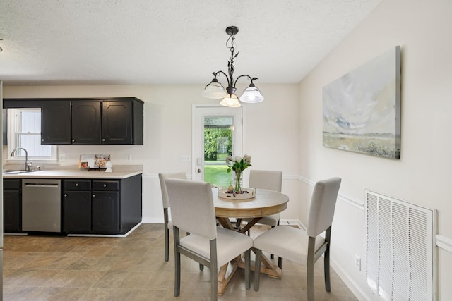 111 Platte Dr, Christiana, TN 37037 - dining area with a textured ceiling and a chandelier