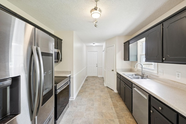 111 Platte Dr, Christiana, TN 37037 - kitchen with appliances with stainless steel finishes, light countertops, and a textured ceiling