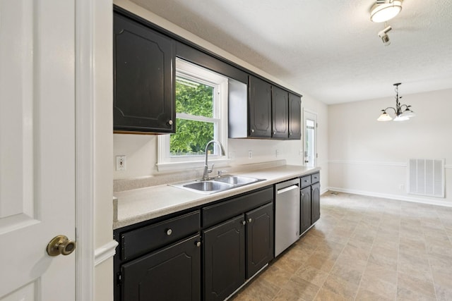 111 Platte Dr, Christiana, TN 37037 - kitchen with dishwasher, light countertops, a chandelier, hanging light fixtures, and a textured ceiling