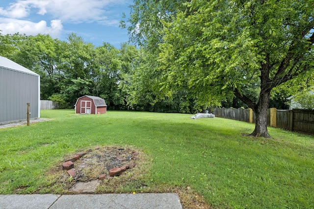 111 Platte Dr, Christiana, TN 37037 - fenced backyard featuring a storage unit