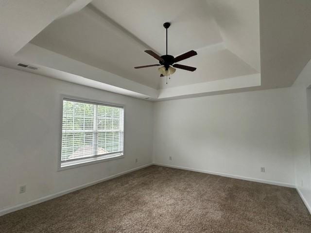 1248 Rich Ellen Dr, Palmyra, TN 37142 - carpeted spare room with a tray ceiling and a ceiling fan
