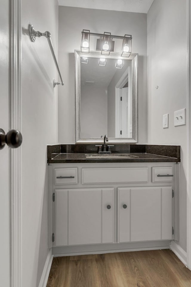 905 Septo Ct, Antioch, TN 37013 - bathroom with vanity and wood finished floors