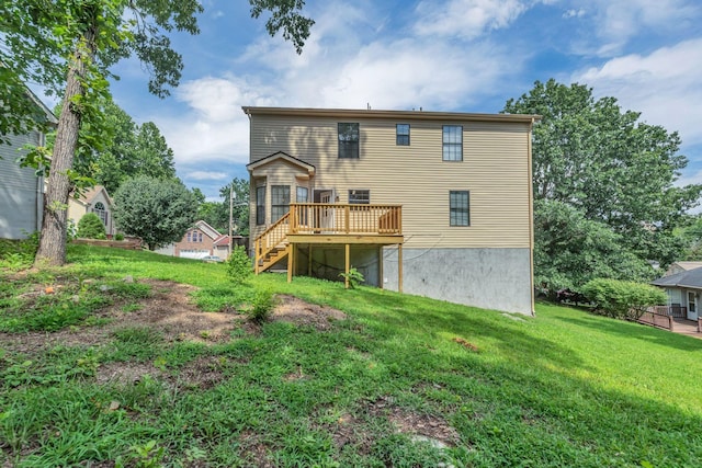 905 Septo Ct, Antioch, TN 37013 - back of house with a wooden deck, stairs, and a yard