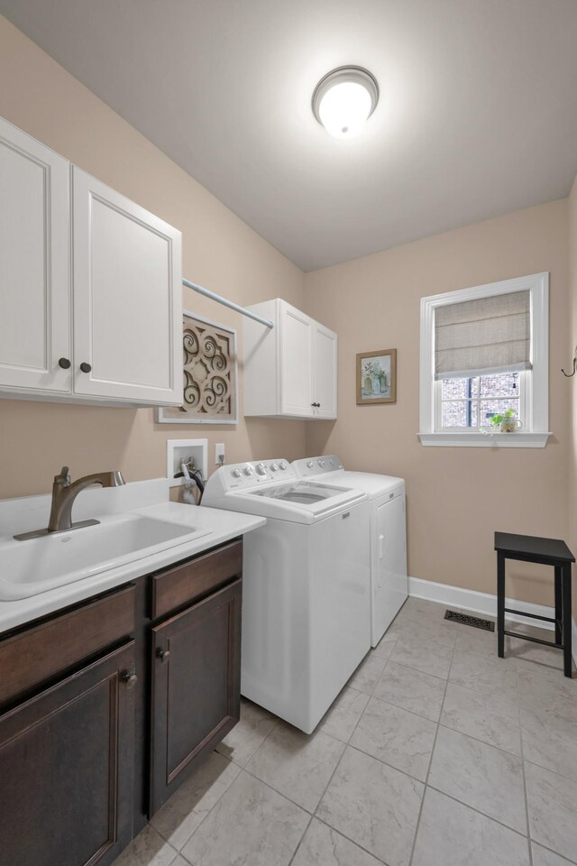 1794 Balvenie Ct, Brentwood, TN 37027 - laundry room featuring cabinet space and independent washer and dryer