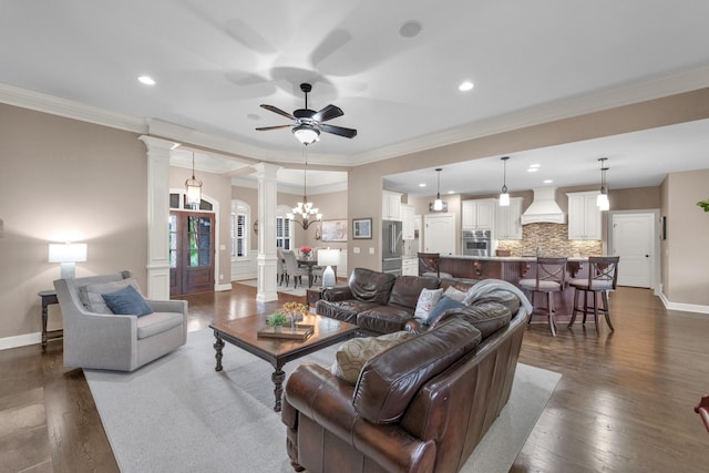 1794 Balvenie Ct, Brentwood, TN 37027 - living area with ceiling fan, a chandelier, ornamental molding, decorative columns, and recessed lighting