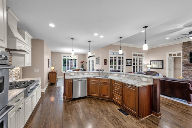 1794 Balvenie Ct, Brentwood, TN 37027 - kitchen with stainless steel appliances, open floor plan, dark wood finished floors, a ceiling fan, and white cabinets